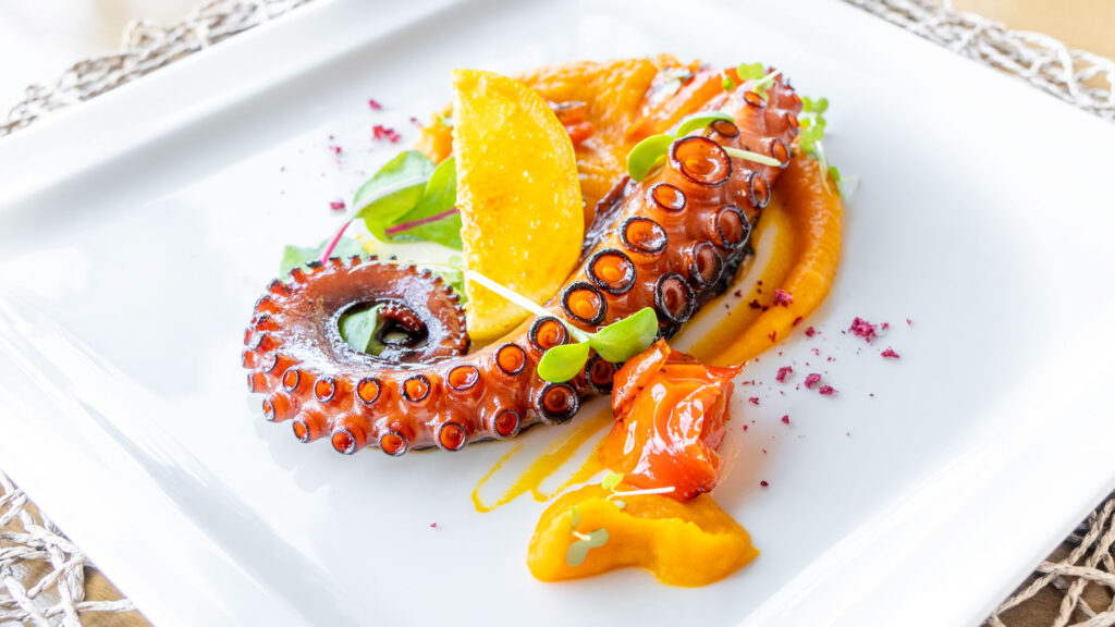 Octopus with pumpkin puree