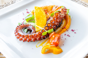 Octopus with pumpkin puree